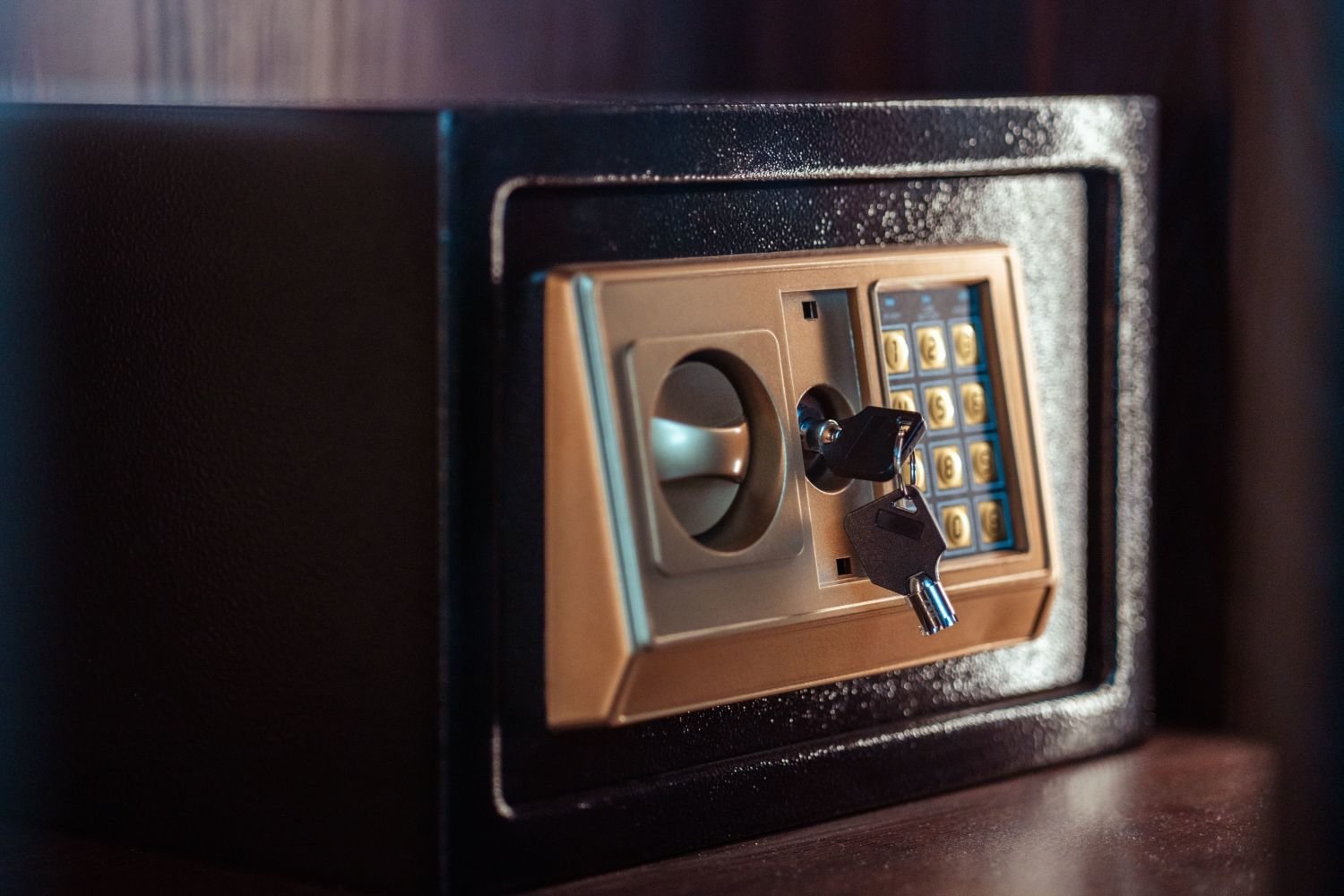 Safety box with keypad and keys.